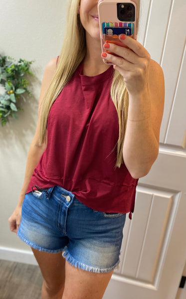 The Shark Bite Side Slit Sleeveless Top