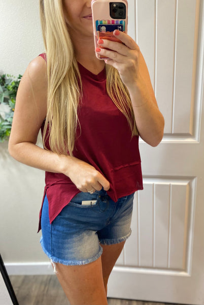 The Shark Bite Side Slit Sleeveless Top